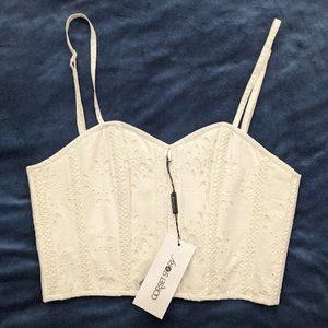 DELIA WHITE BRODERIE ANGLAISE COTTON CROPPED CORSET WITH SPAGHETTI STRAPS. 26"